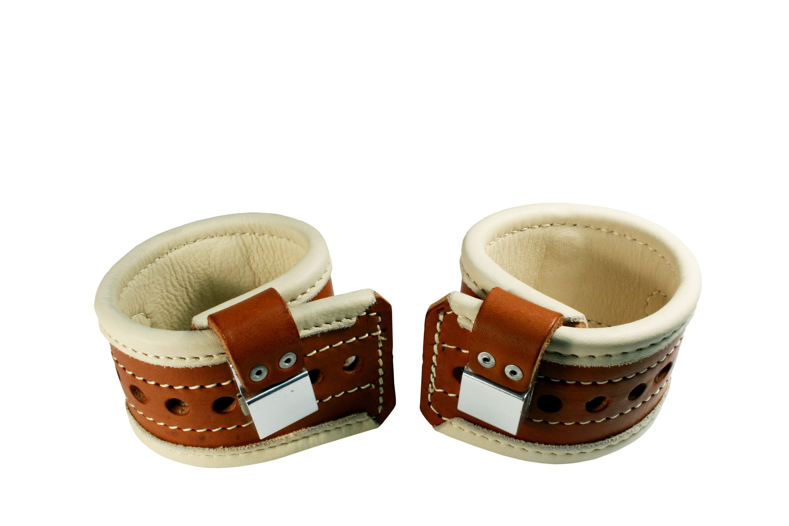 Padded leather wrist restraints.